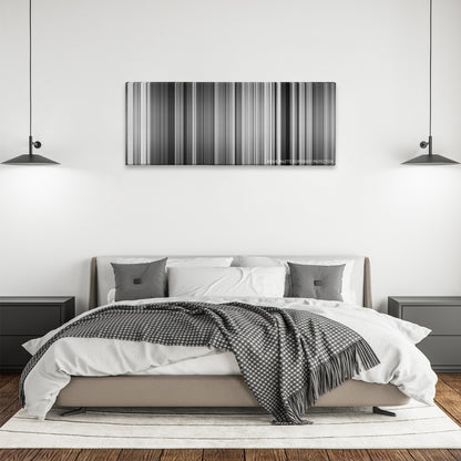 Sunset Blvd. color palette canvas above a bed, between two black pendant lamps