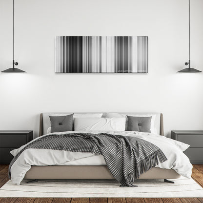 Paths of Glory color palette canvas above a bed, between two black pendant lamps