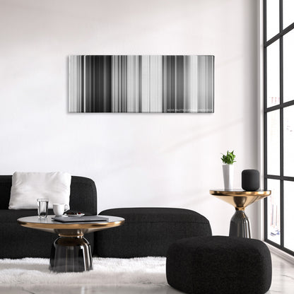 Paths of Glory color palette canvas above a black sofa with a gold-topped table