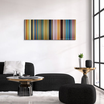The Good Dinosaur color palette canvas above a black sofa with a gold-topped table