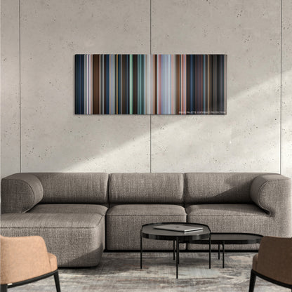 Shazam! color palette canvas on a concrete wall above a gray sectional sofa