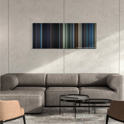 Terminator Genisys color palette canvas on a concrete wall above a gray sectional sofa