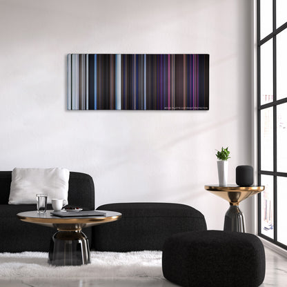 The Thing color palette canvas above a black sofa with a gold-topped table