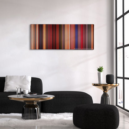 Fear and Loathing in Las Vegas color palette canvas above a black sofa with a gold-topped table