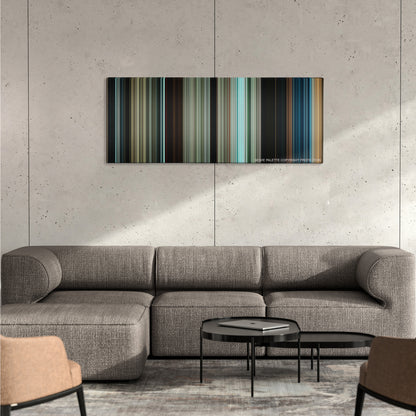 Pirates of the Caribbean: Dead Men Tell No Tales color palette canvas on a concrete wall above a gray sectional sofa