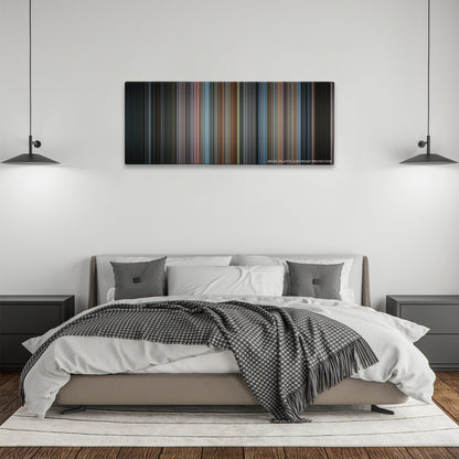 Men in Black color palette canvas above a bed, between two black pendant lamps
