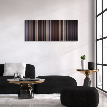 American Beauty color palette canvas above a black sofa with a gold-topped table