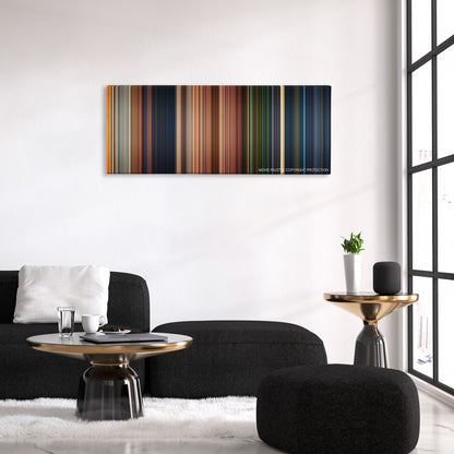 Monster House color palette canvas above a black sofa with a gold-topped table