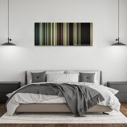 It color palette canvas above a bed, between two black pendant lamps