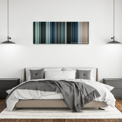 Power Rangers color palette canvas above a bed, between two black pendant lamps