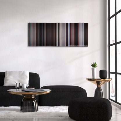 Conan the Barbarian color palette canvas above a black sofa with a gold-topped table