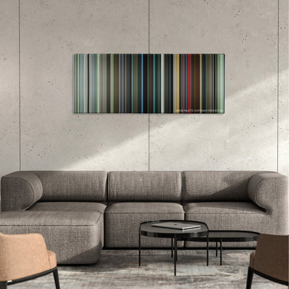 Midnight Cowboy color palette canvas on a concrete wall above a gray sectional sofa