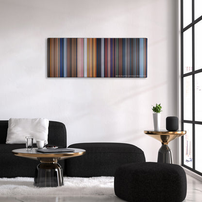 Pinocchio color palette canvas above a black sofa with a gold-topped table