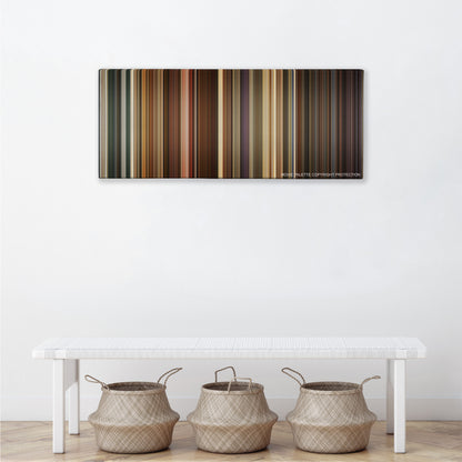 Idiocracy color palette canvas above a white bench with three woven baskets