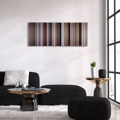 Dr. No color palette canvas above a black sofa with a gold-topped table