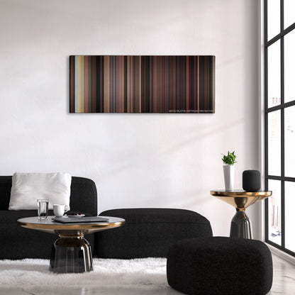 Carrie color palette canvas above a black sofa with a gold-topped table