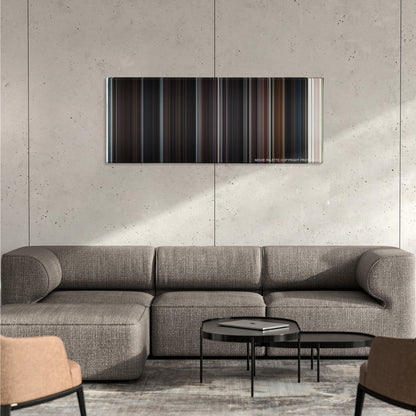Road to Perdition color palette canvas on a concrete wall above a gray sectional sofa