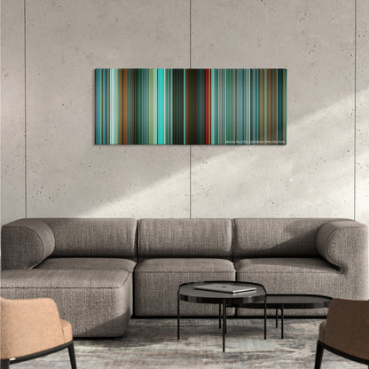 Unknown color palette canvas on a concrete wall above a gray sectional sofa