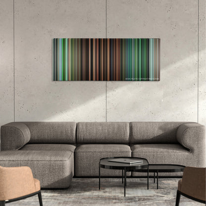 Rescue Dawn color palette canvas on a concrete wall above a gray sectional sofa