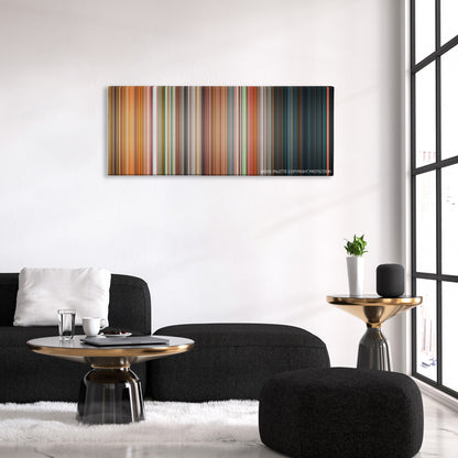 Friday color palette canvas above a black sofa with a gold-topped table