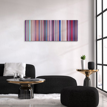 Sing color palette canvas above a black sofa with a gold-topped table