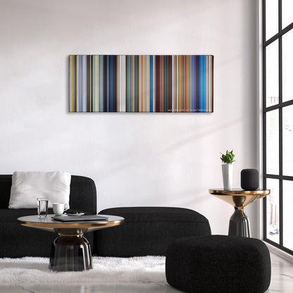 Klaus color palette canvas above a black sofa with a gold-topped table