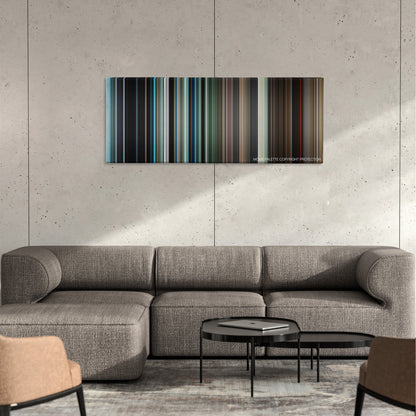 Silence color palette canvas on a concrete wall above a gray sectional sofa