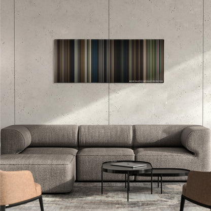 Gone Baby Gone color palette canvas on a concrete wall above a gray sectional sofa