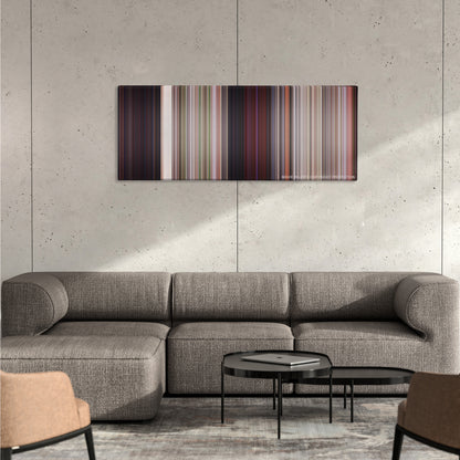 2 Fast 2 Furious color palette canvas on a concrete wall above a gray sectional sofa