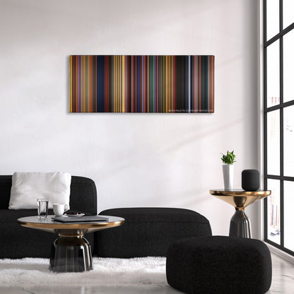 The Prince of Egypt color palette canvas above a black sofa with a gold-topped table
