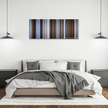 Brick color palette canvas above a bed, between two black pendant lamps