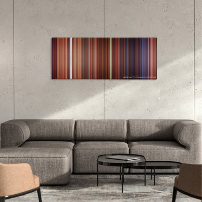 Shanghai Knights color palette canvas on a concrete wall above a gray sectional sofa