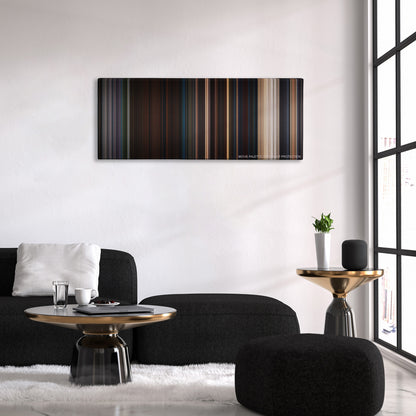 Planet of the Apes color palette canvas above a black sofa with a gold-topped table