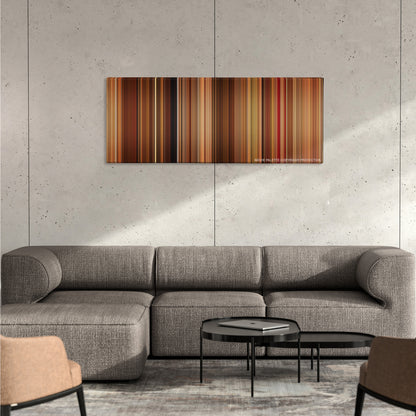 Vicky Cristina Barcelona color palette canvas on a concrete wall above a gray sectional sofa