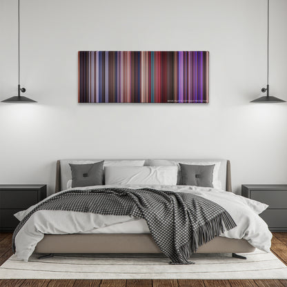 Miss Congeniality color palette canvas above a bed, between two black pendant lamps