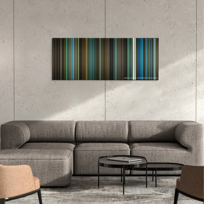 Attack the Block color palette canvas on a concrete wall above a gray sectional sofa