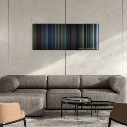 The Adjustment Bureau color palette canvas on a concrete wall above a gray sectional sofa