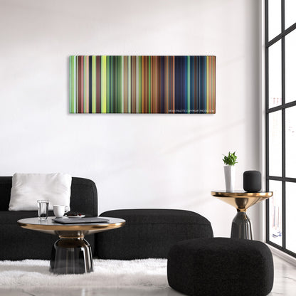 Epic color palette canvas above a black sofa with a gold-topped table