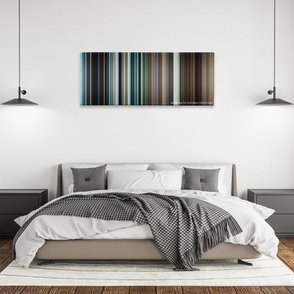 Silence color palette canvas above a bed, between two black pendant lamps