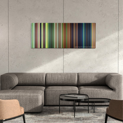 Epic color palette canvas on a concrete wall above a gray sectional sofa