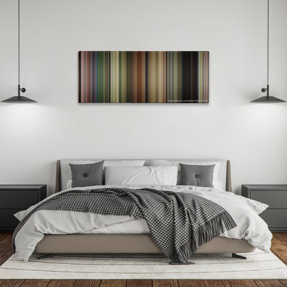 Jumanji: Welcome to the Jungle color palette canvas above a bed, between two black pendant lamps