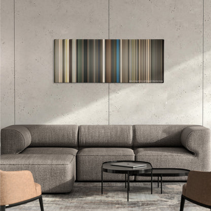 RocknRolla color palette canvas on a concrete wall above a gray sectional sofa