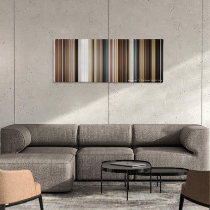 Downsizing color palette canvas on a concrete wall above a gray sectional sofa