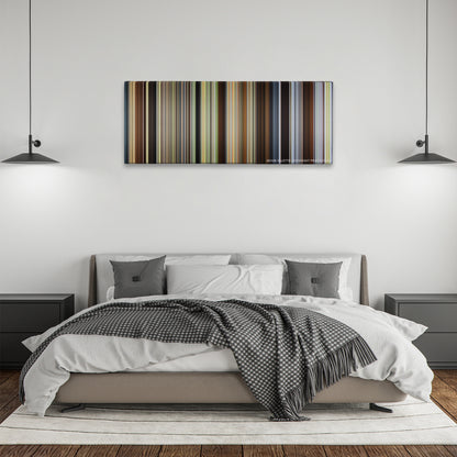 Cold Mountain color palette canvas above a bed, between two black pendant lamps