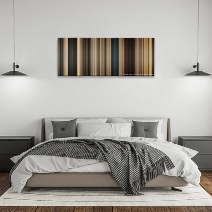 300 color palette canvas above a bed, between two black pendant lamps