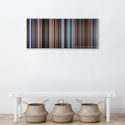 The Spy Who Loved Me color palette canvas above a white bench with three woven baskets