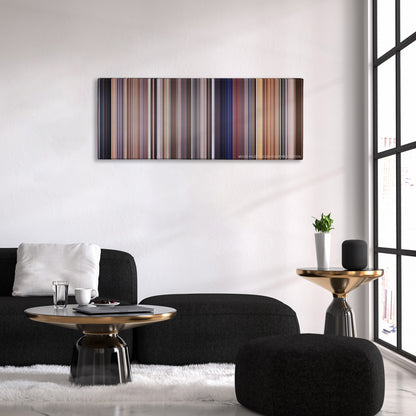 A Clockwork Orange color palette canvas above a black sofa with a gold-topped table