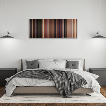 Field of Dreams color palette canvas above a bed, between two black pendant lamps