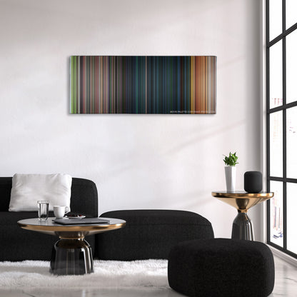 Snakes on a Plane color palette canvas above a black sofa with a gold-topped table