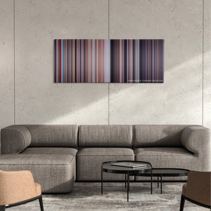 You Only Live Twice color palette canvas on a concrete wall above a gray sectional sofa